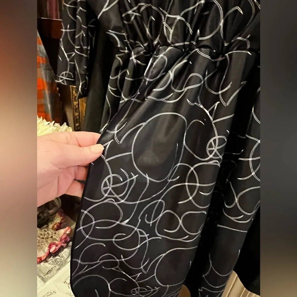 The Swim Dress is a full-coverage swimsuit XL (18/20)